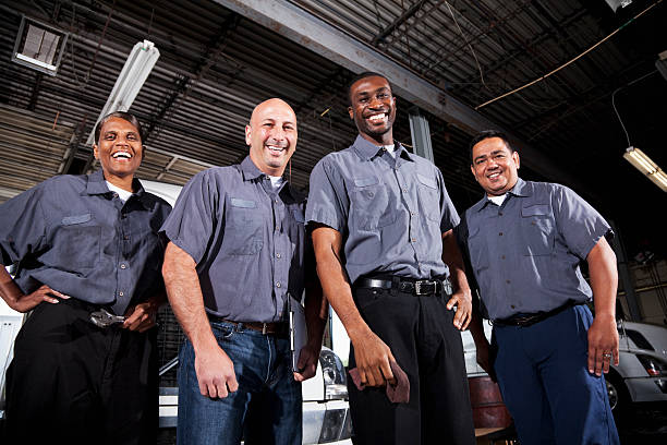 Group of happy workers in corporate clothing